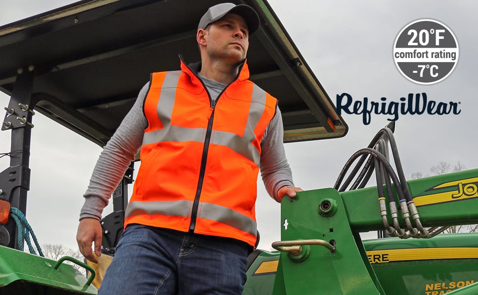 Man working outside wearing the hivis reversible vest
