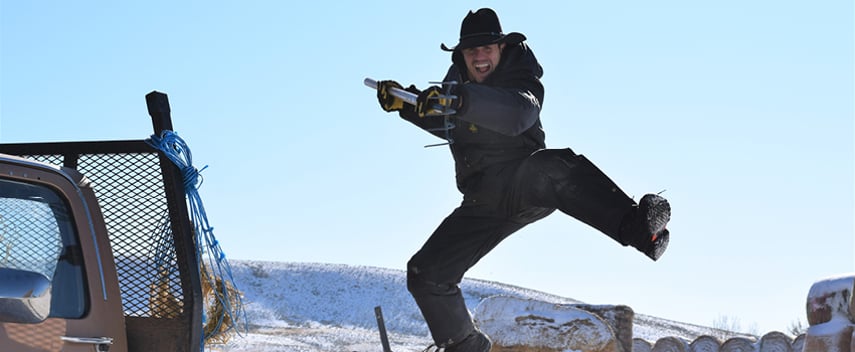 Lance Pekus has a little fun on the ranch .