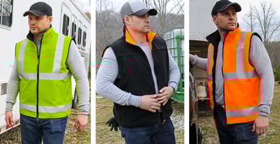 3 men outside in different all weather workwear.