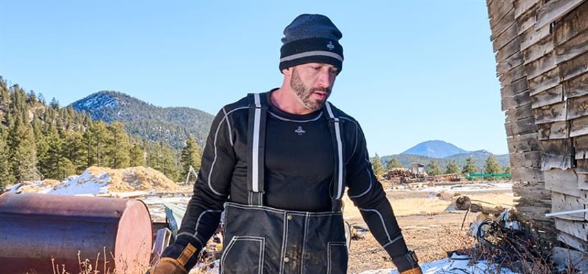 Man wearing RefrigiWear working outdoors in Refrigiwear base layers.