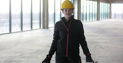 A woman in Softshell Jacket.