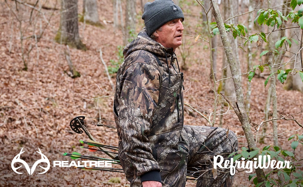 Man wearing the Realtree™ APX Camo Thermal Sweatshirt bow hunting in the woods