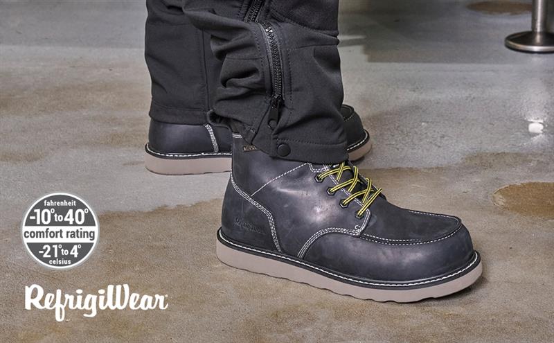 Close up of someone wearing the Classic Moc Toe Boot