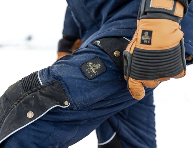 Close up of someone wearing the 1954 golve in the snow