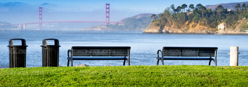 Picture of two Benches on the Tiburon shoreline Facing the Golden Gate Bridge in Tiburon, California.