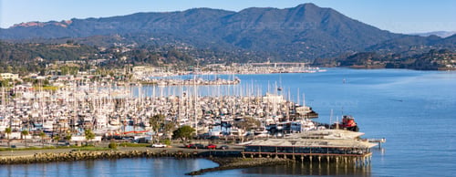 Aerial Picture at Sunrise of Sausalito Yacht Harbor and the Spinnaker with Mt. Tam in the background in Sausalito, California.