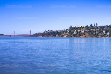 Picture of Golden Gate Bridge and Belvedere Island Homes from shoreline in Tiburon, California