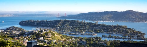 Picture of Sunset of Belvedere Island and Belvedere Lagoon with Golden Gate Bridge and San Francisco in the background taken from Tiburon, California hilltop (Wide Angle Shot). 