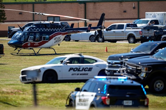 A medical helicopter is seen in front of Apalachee High School after a shooting at the school Wednesday, Sept. 4, 2024, in Winder, Ga.  (AP Photo/Mike Stewart)