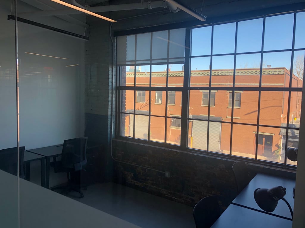 An interior shot of 4 Desk Window Office