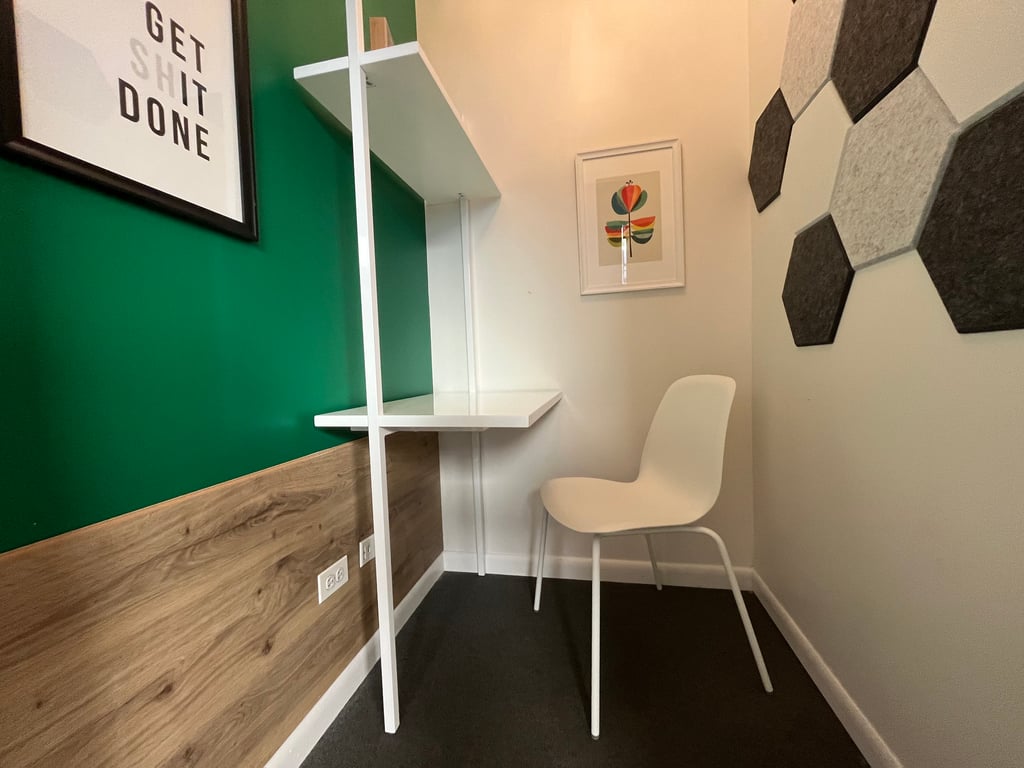 An interior shot of Phone Booth 1