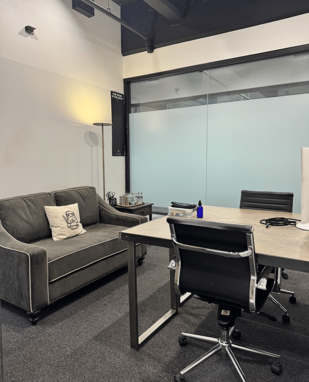 An interior shot of Office 211 - 2 Person Workspace with Whiteboard Wall