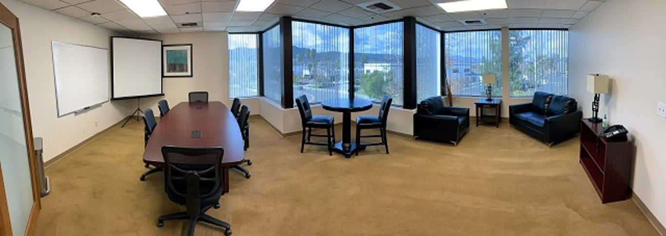 An interior shot of Medium Conference Room 218