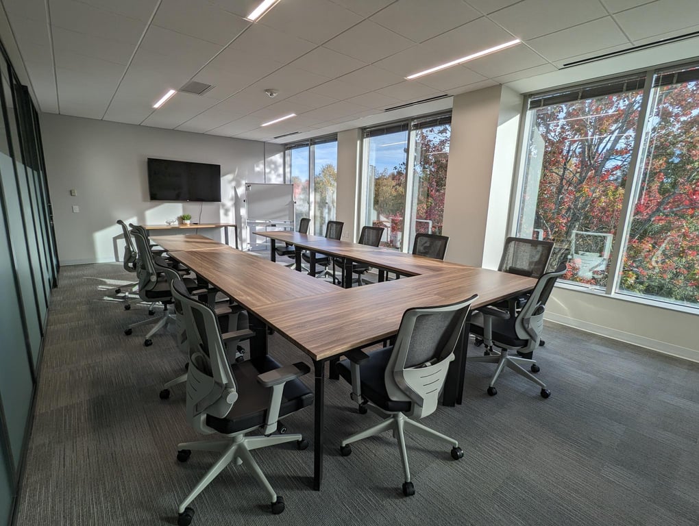 An interior shot of Large Team Suite 308 - 12 seats