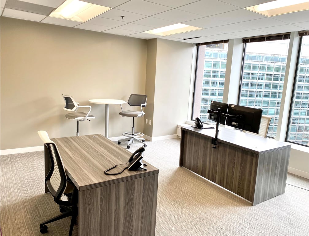 An interior shot of 5-8 Person Private Exterior Office