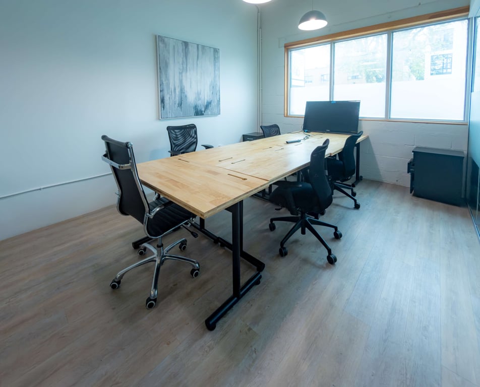 An interior shot of 6-Person Office With Window