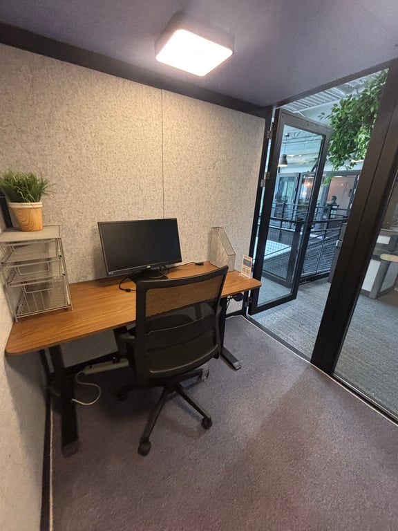 An interior shot of Sound-Proof Daily Office Pods at LionShare Cowork