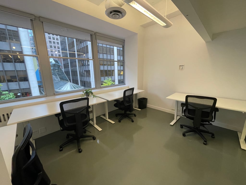 An interior shot of 4 Person Private Office