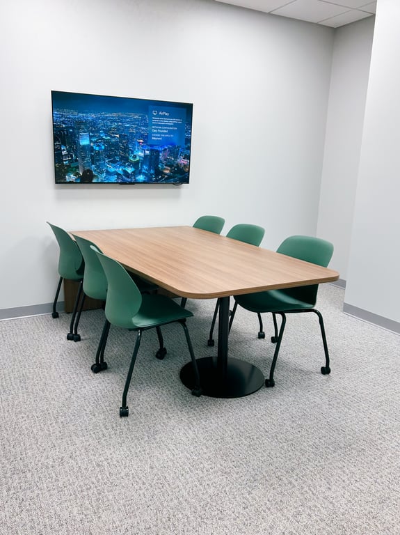 An interior shot of 6-person Huddle Room