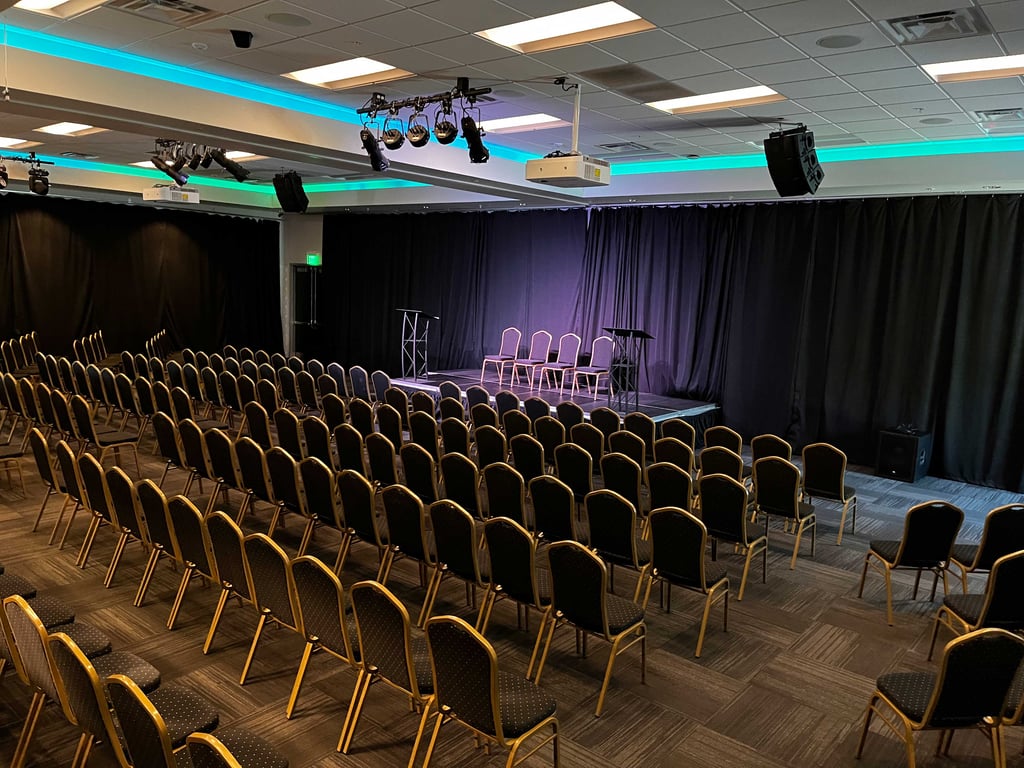 An interior shot of West Banquet + Projector & Speaker/Microphone
