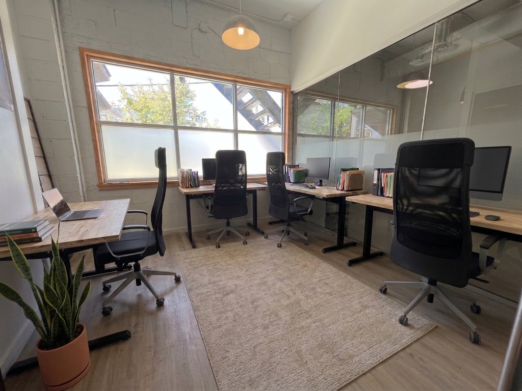 An interior shot of 4-Person Office With Window