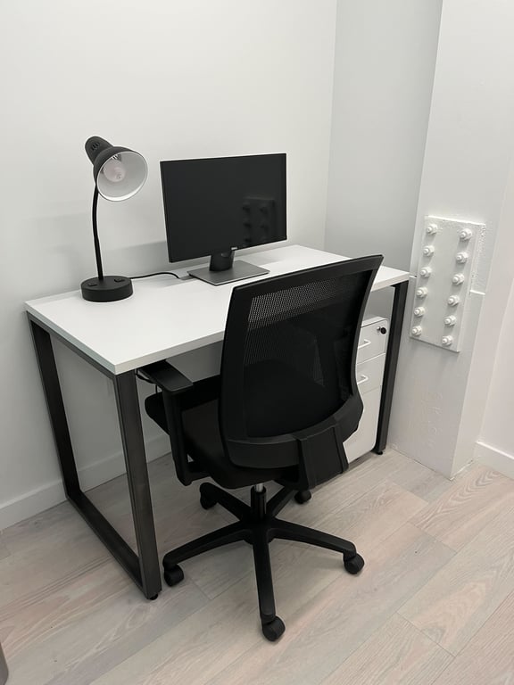 An interior shot of 1 Desk Interior Office