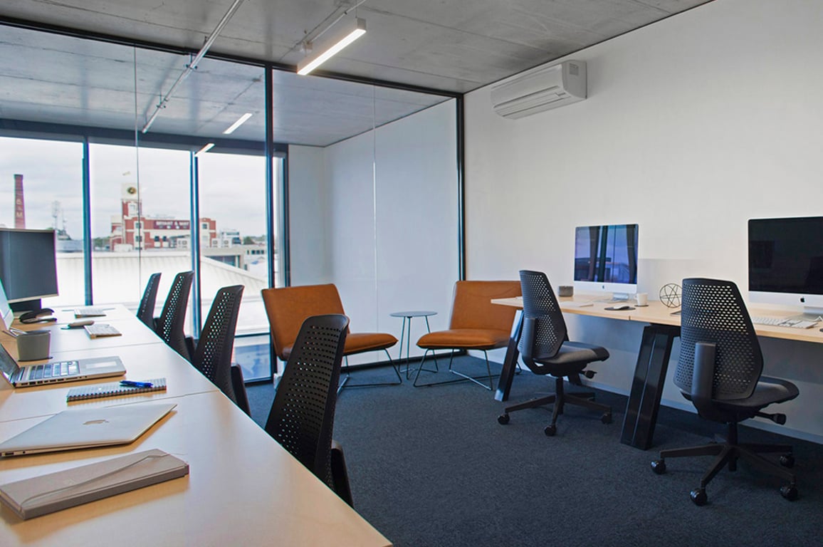 An interior shot of 8 Person Private Office
