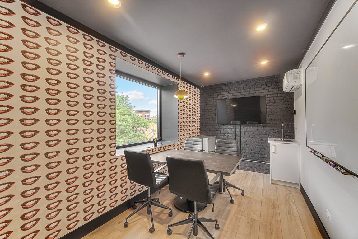 An interior shot of Huddle Room