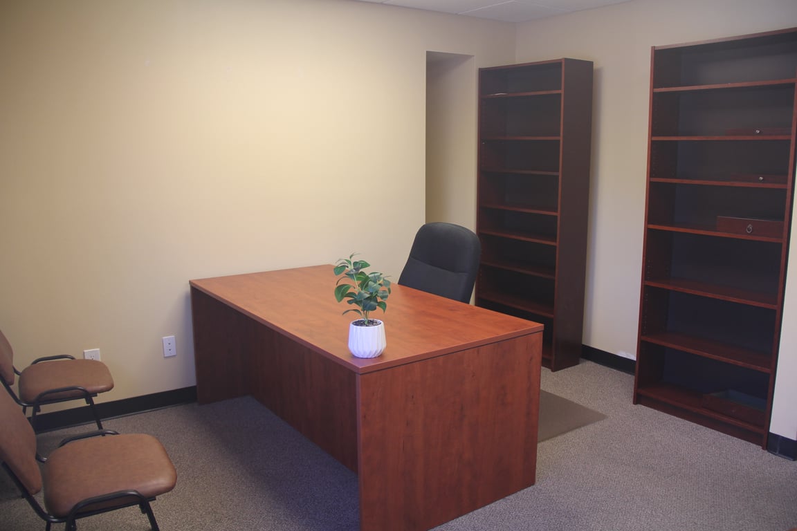 An interior shot of Executive for 1 person Office #204 – No Glass Divider. Private Workspace with Natural Light
