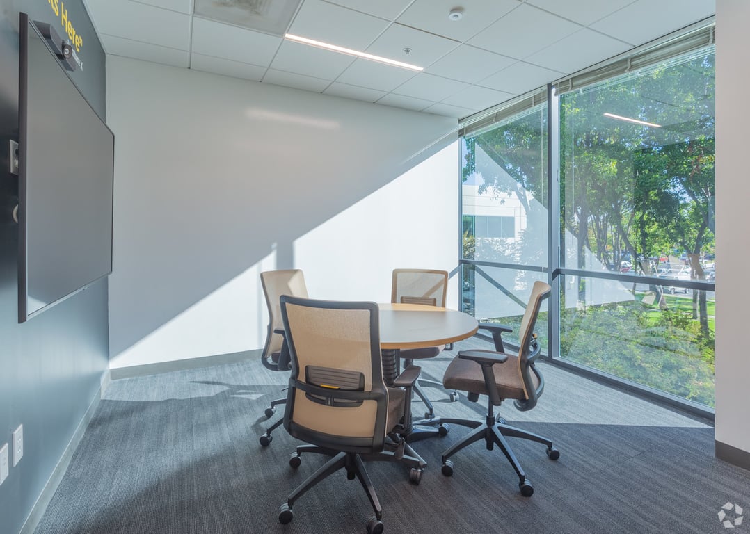 An interior shot of 4 Person Conference Room