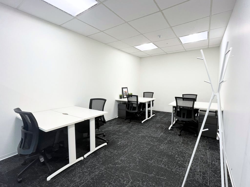 An interior shot of 6 Person Private Office