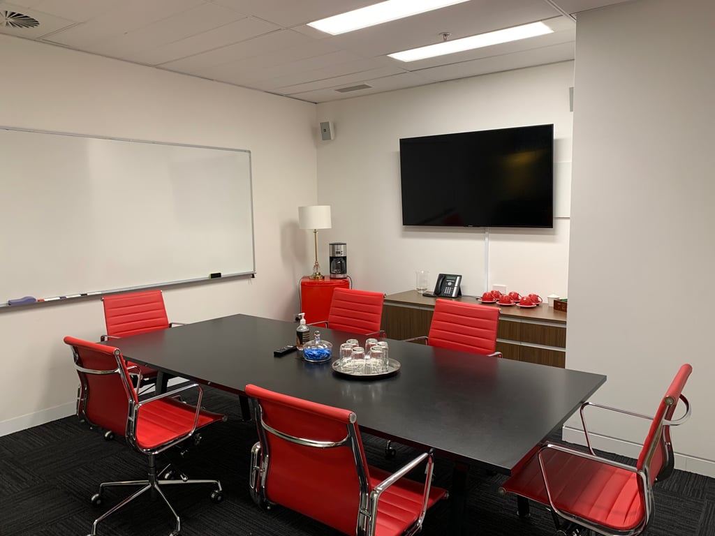 An interior shot of 6 Person Meeting Room