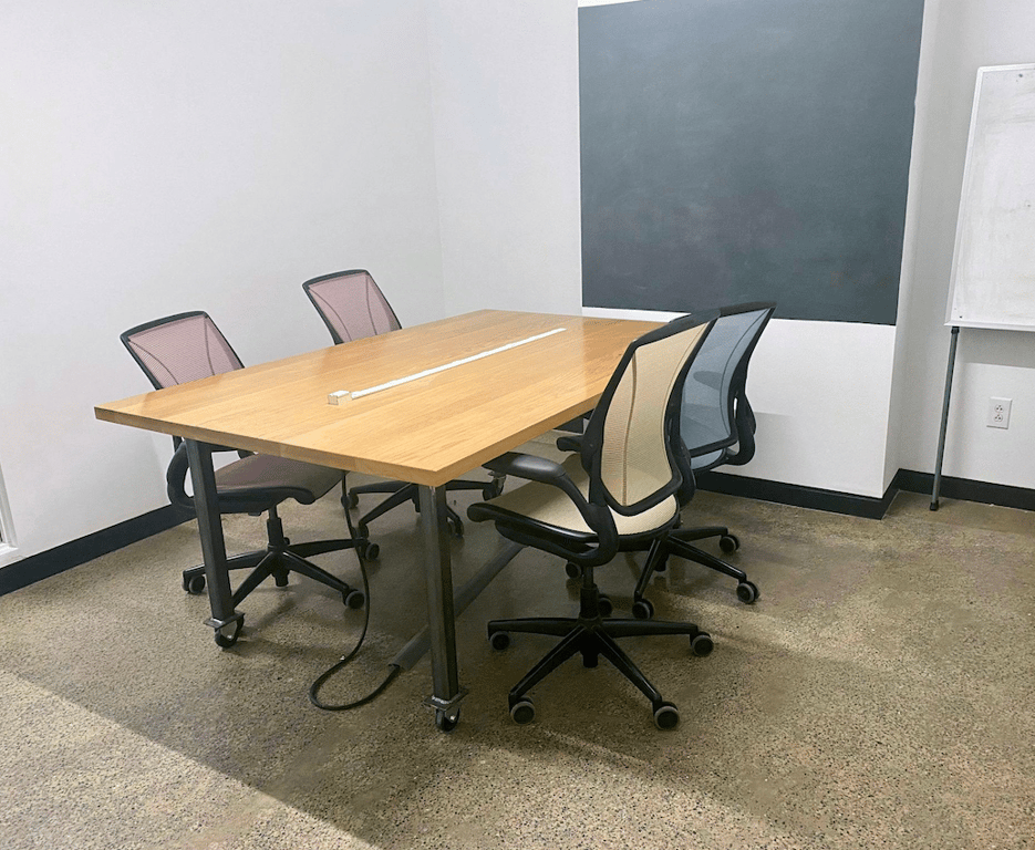 An interior shot of 4-Person Group Work Office