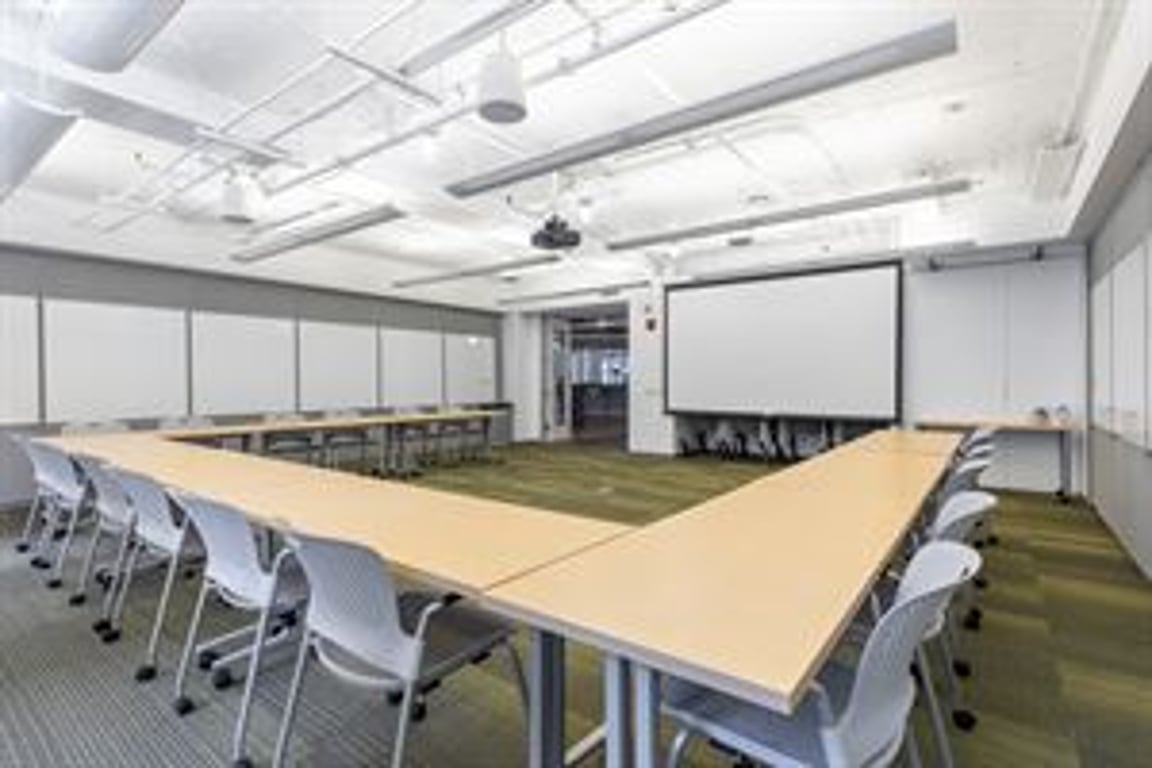 An interior shot of Conference Room C! Virtual Enabled Meeting Rooms with City Views | Ideal for In-Person & Virtual Off-sites | Bright & Modern in a Tech Focused Shared Workspace