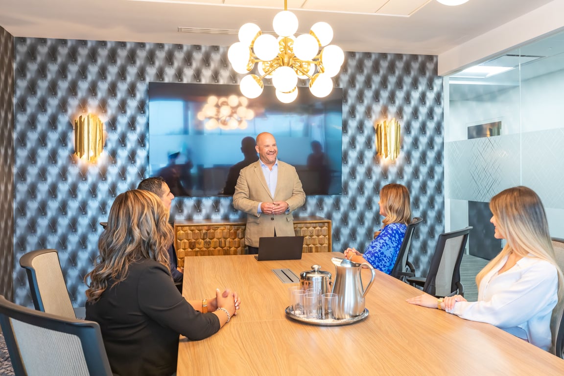 An interior shot of Boardroom 12 people