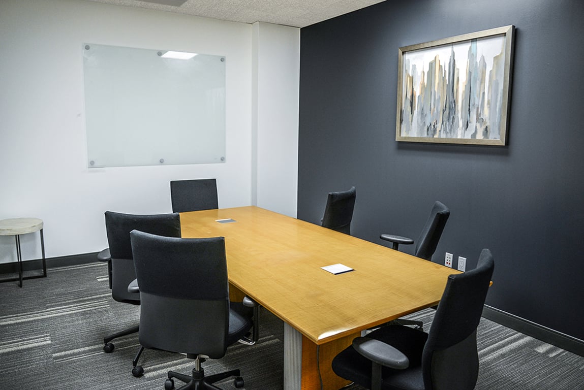An interior shot of 6 Person Meeting Room