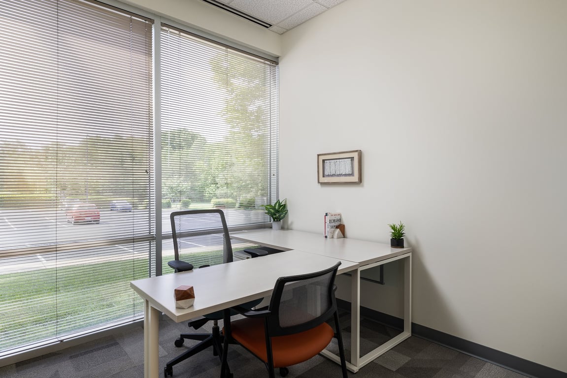 An interior shot of 3 Person - Private Exterior Office 114