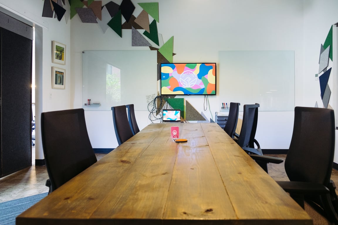 An interior shot of Flight Room: Creative 6-Person Meeting Room With Natural Light