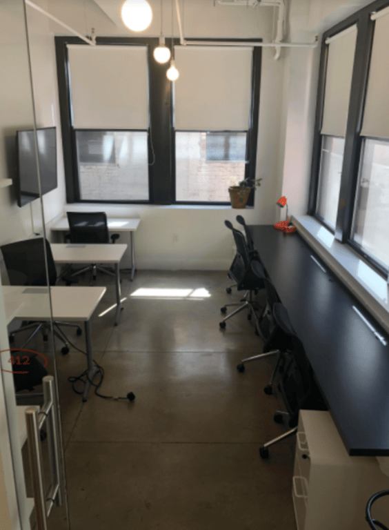 An interior shot of 8 Person private Office