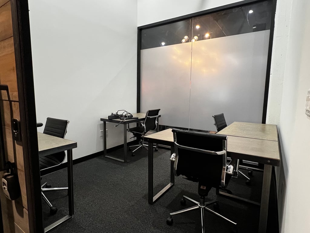 An interior shot of 4 Person Private Office, Team Work Space - Office 110