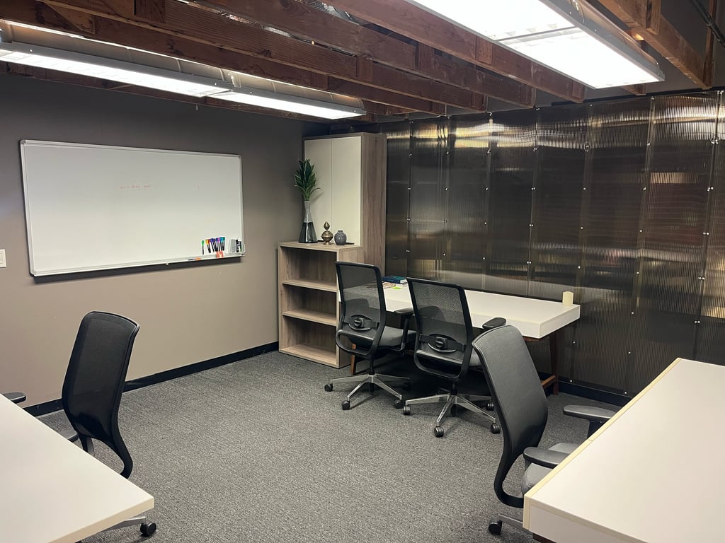 An interior shot of 2-6 Person Day Office