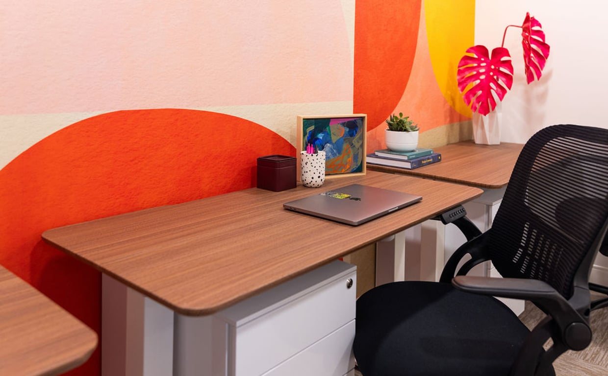 An interior shot of Dedicated Desk: The Mural Point (Center)