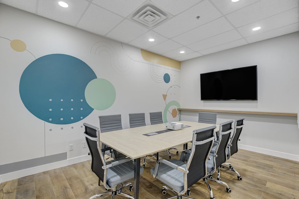 An interior shot of Incubase Workspace Huddle Room