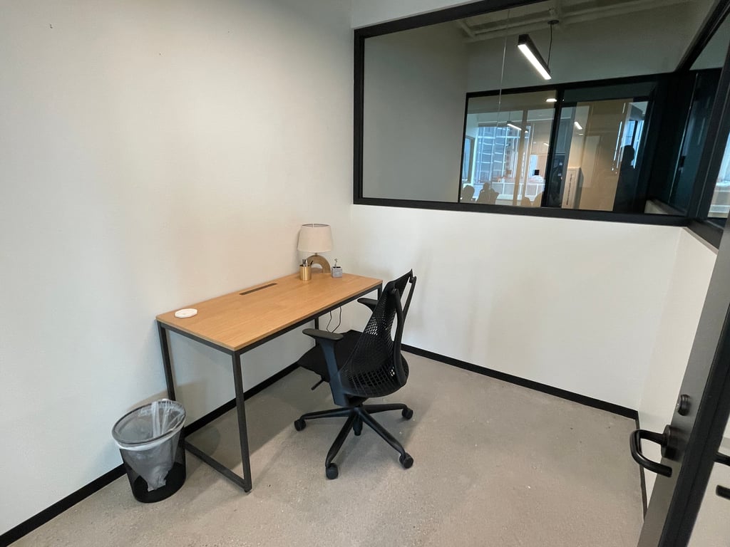 An interior shot of One-Person Office