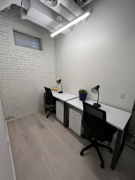 An interior shot of 2 Desk Interior Office