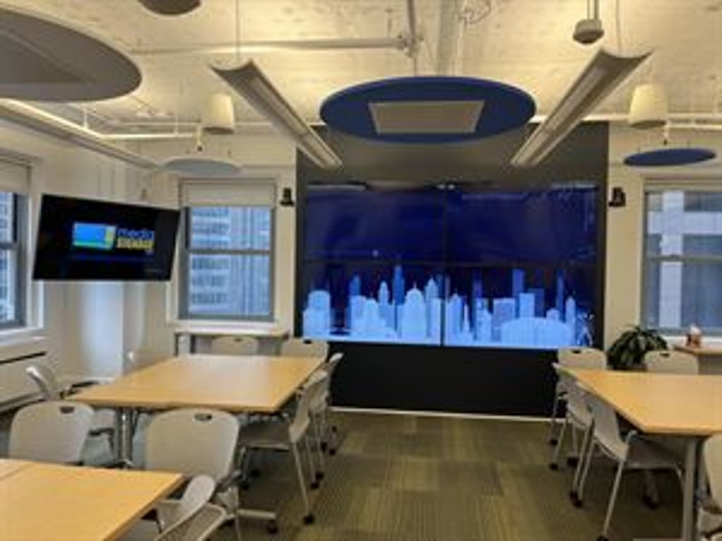 An interior shot of Virtual Enabled Meeting Rooms with City Views | Ideal for In-Person & Virtual Off-sites | Bright & Modern in a Tech Focused Shared Workspace! Conference Room D