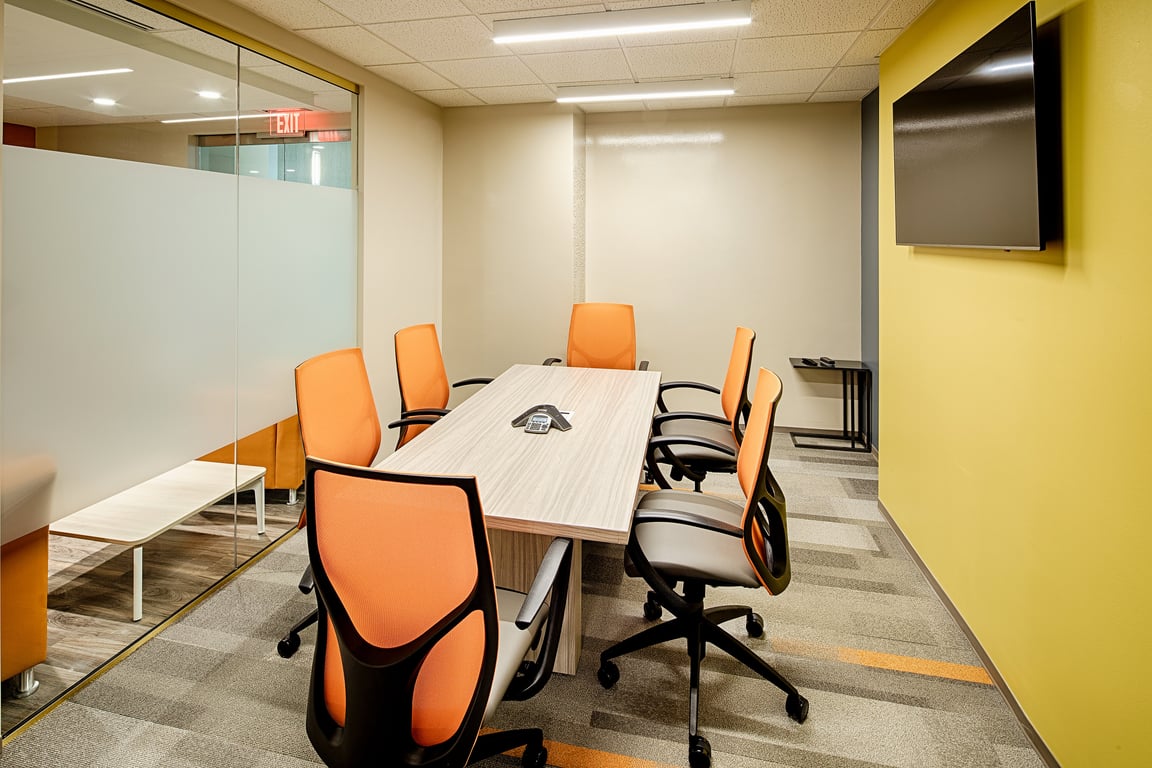 An interior shot of Medium Sized Conference Room / Team room