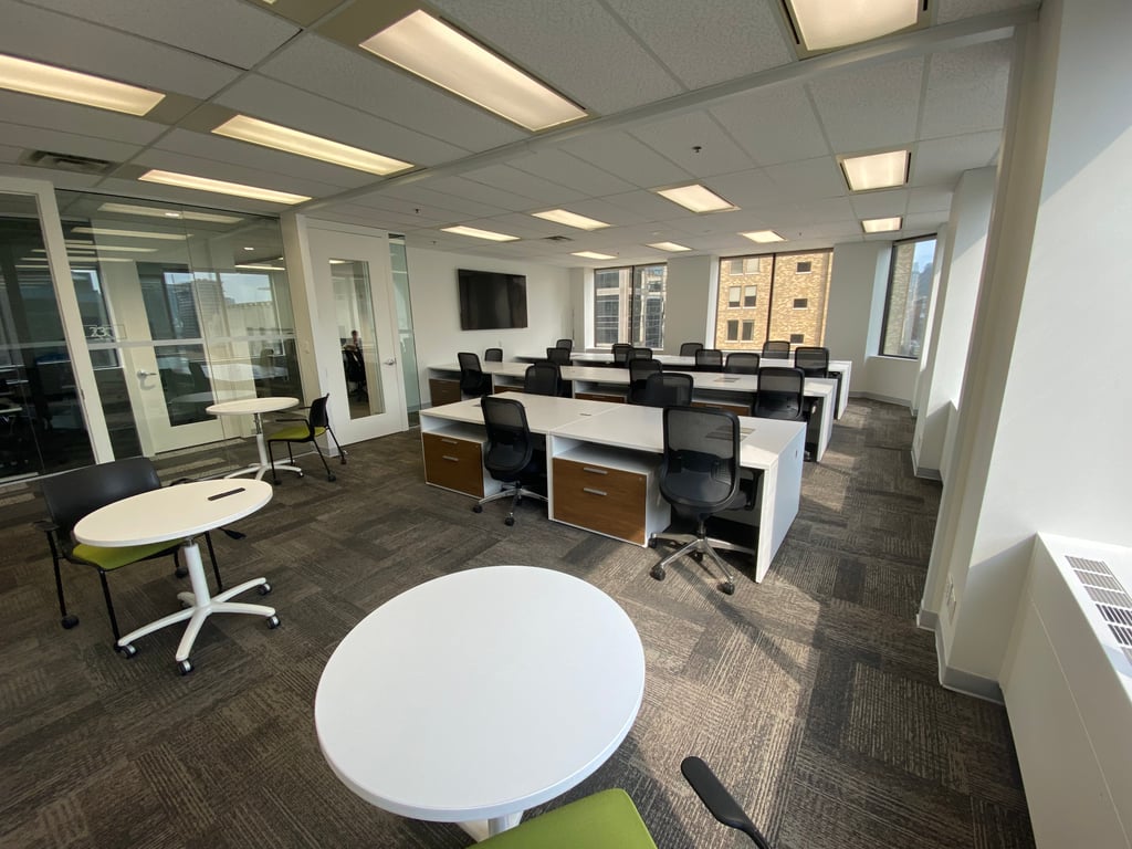 An interior shot of #31 30 Person Corner Window Office