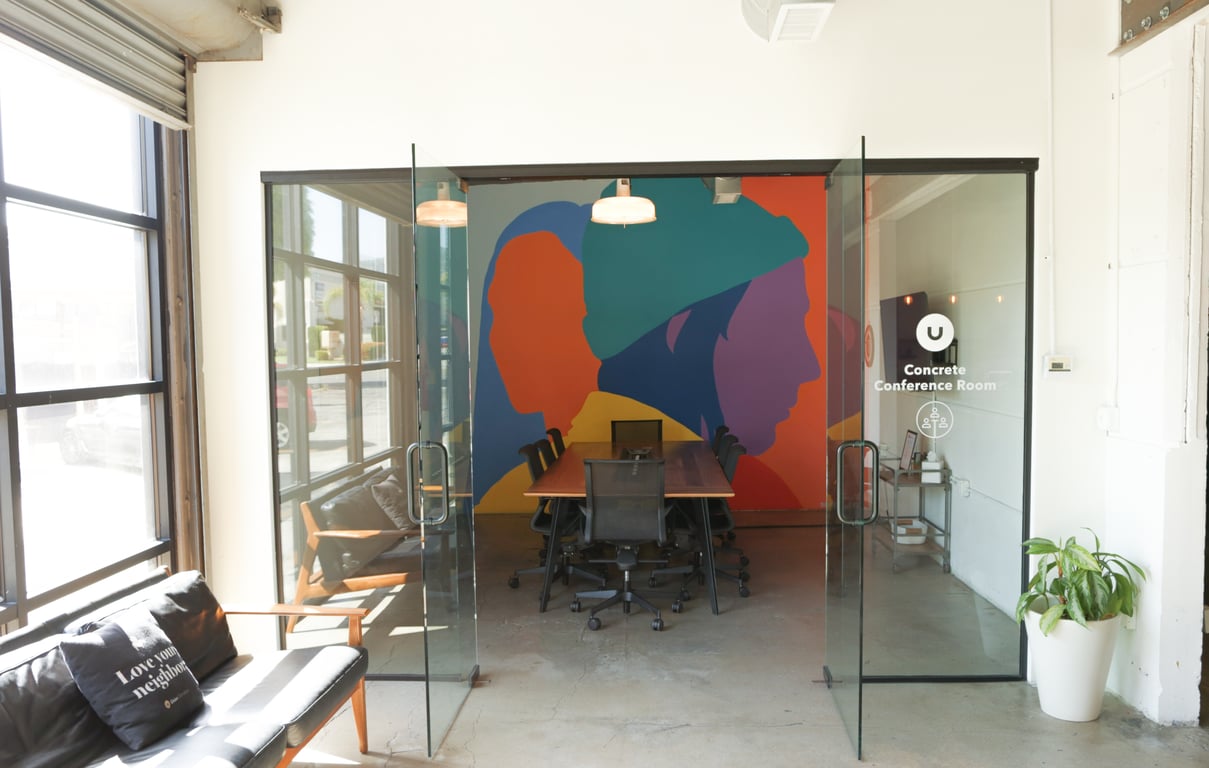 An interior shot of Downstairs Concrete Conference Room
