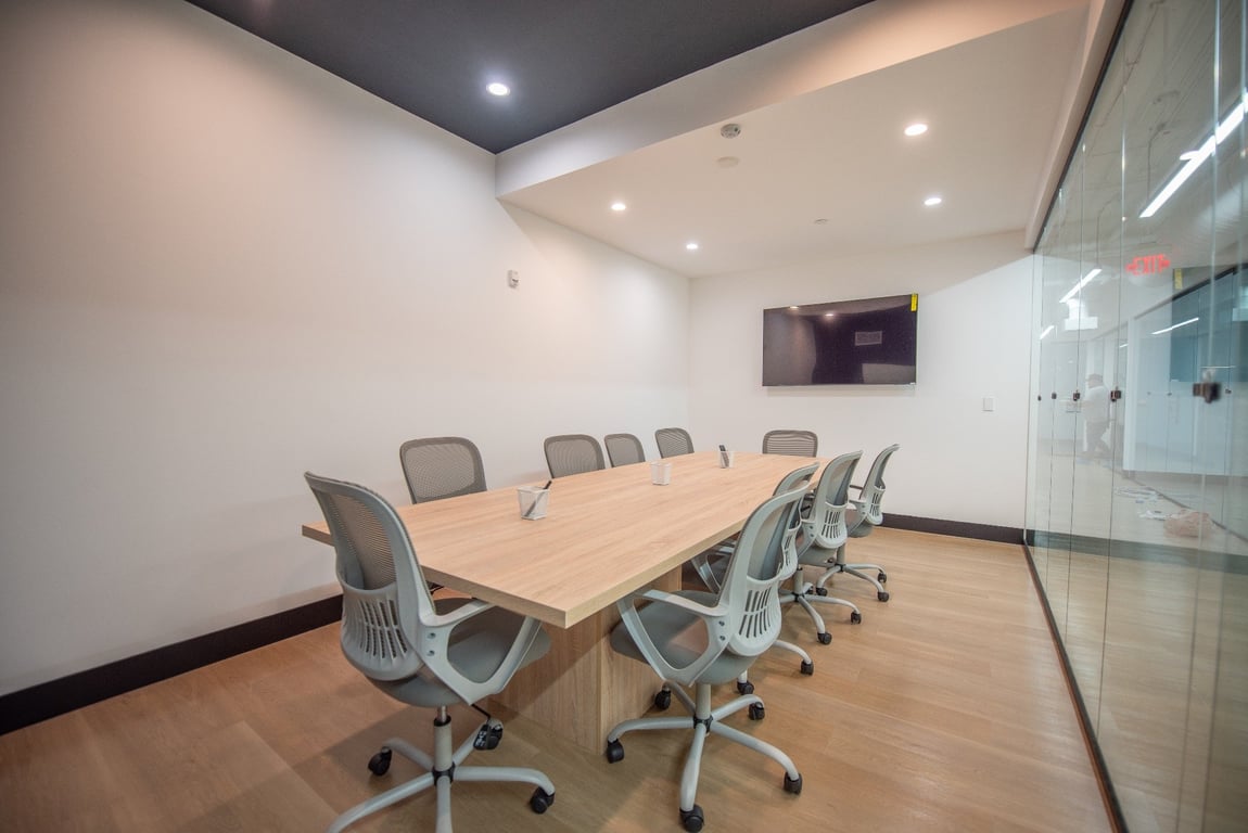An interior shot of Conference Room 10 people
